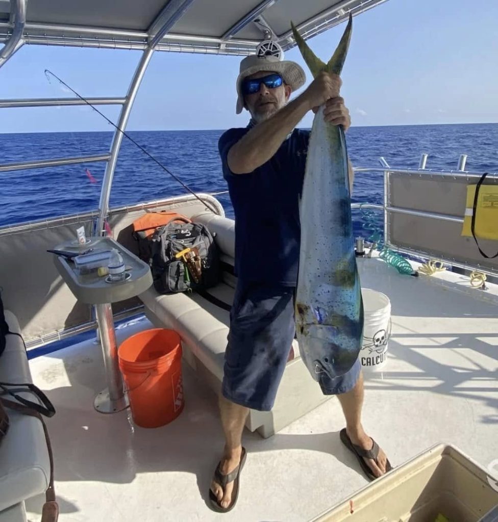 Person is enjoying Inshore Fishing with Custom Cat Charters