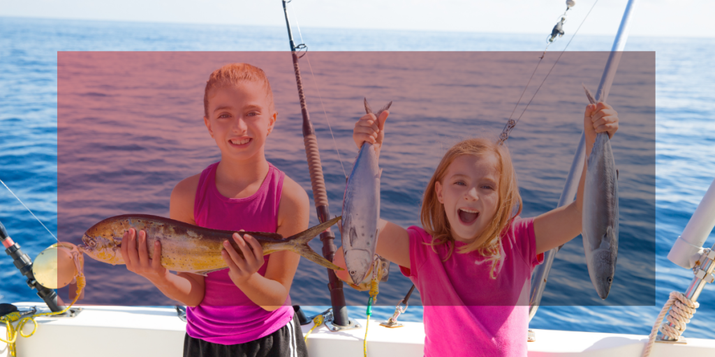 Nearshore fishing is complete and perfect for kids and family,Kids holding fresh catch of the day on Custom Cat Charters fishing excursion