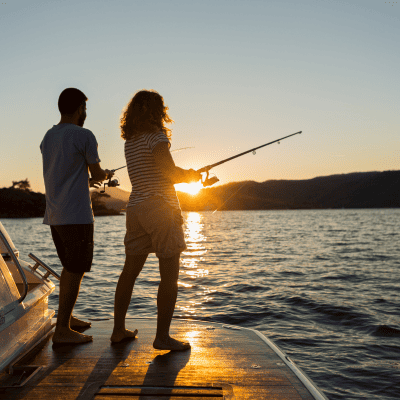 Family enjoys sunset fishing trips with custom cat charters in Marathon, FL.