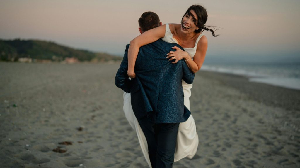 Loving Couple, They are enjoying their Beach Wedding in Florida key.