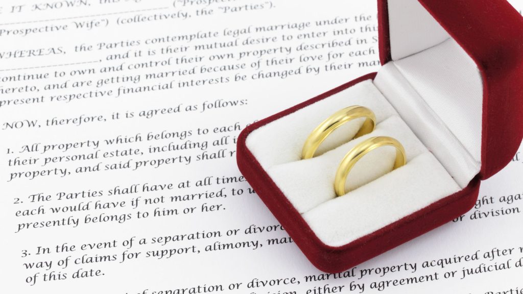 Florida marriage certificate and wedding rings showing a legally valid marriage.